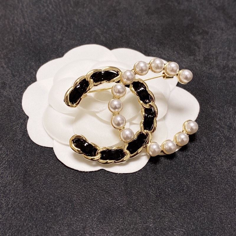 Ch*el brooches